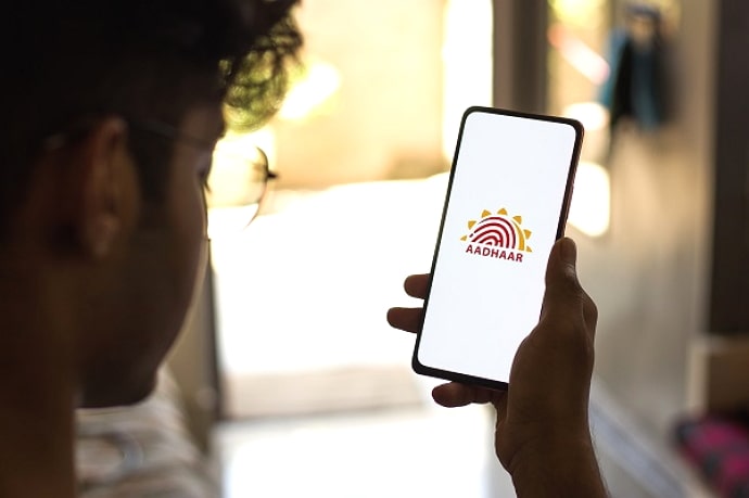 find someone's phone number from aadhar card